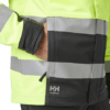 77220-369_2 Helly Hansen Alna 2.0 huomiotakki musta/keltainen