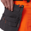 77503-269_3 Helly Hansen ICU riipputaskushortsit musta/oranssi